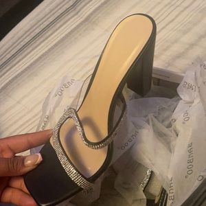 Black and silver short heel , classy woman fashion .